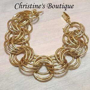 Goldtone bracelet, link style with triple round link design